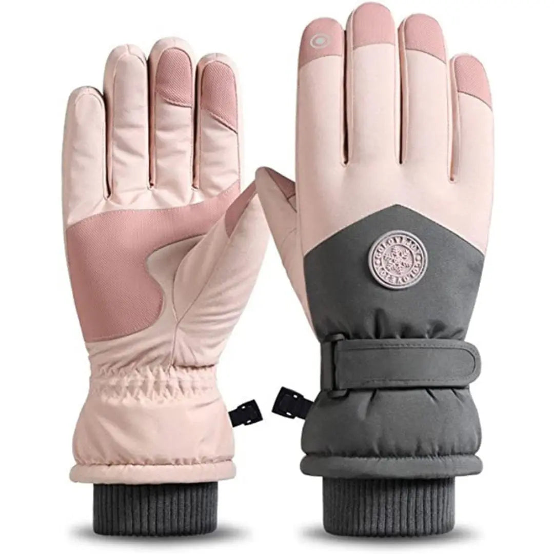 Gant de ski femme rose avec flocon. L'image est sur un fond blanc.