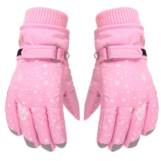 Gant de ski enfant rose pour fille avec des petites fleurs blanches. L'image est sur fond blanc.