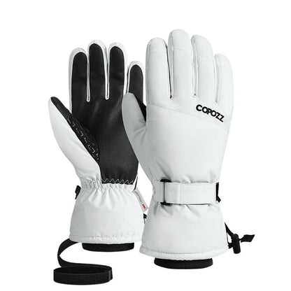Gants de ski femme coupe-vent ultraléger en blanc avec paume en thermoplastique et sangle de maintien.