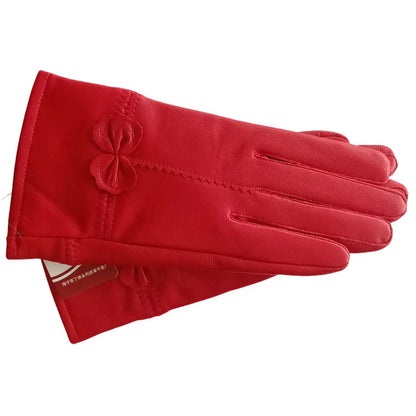 Gant en cuir rouge avec nœud papillon et doublure polaire pour femme sur fond blanc.